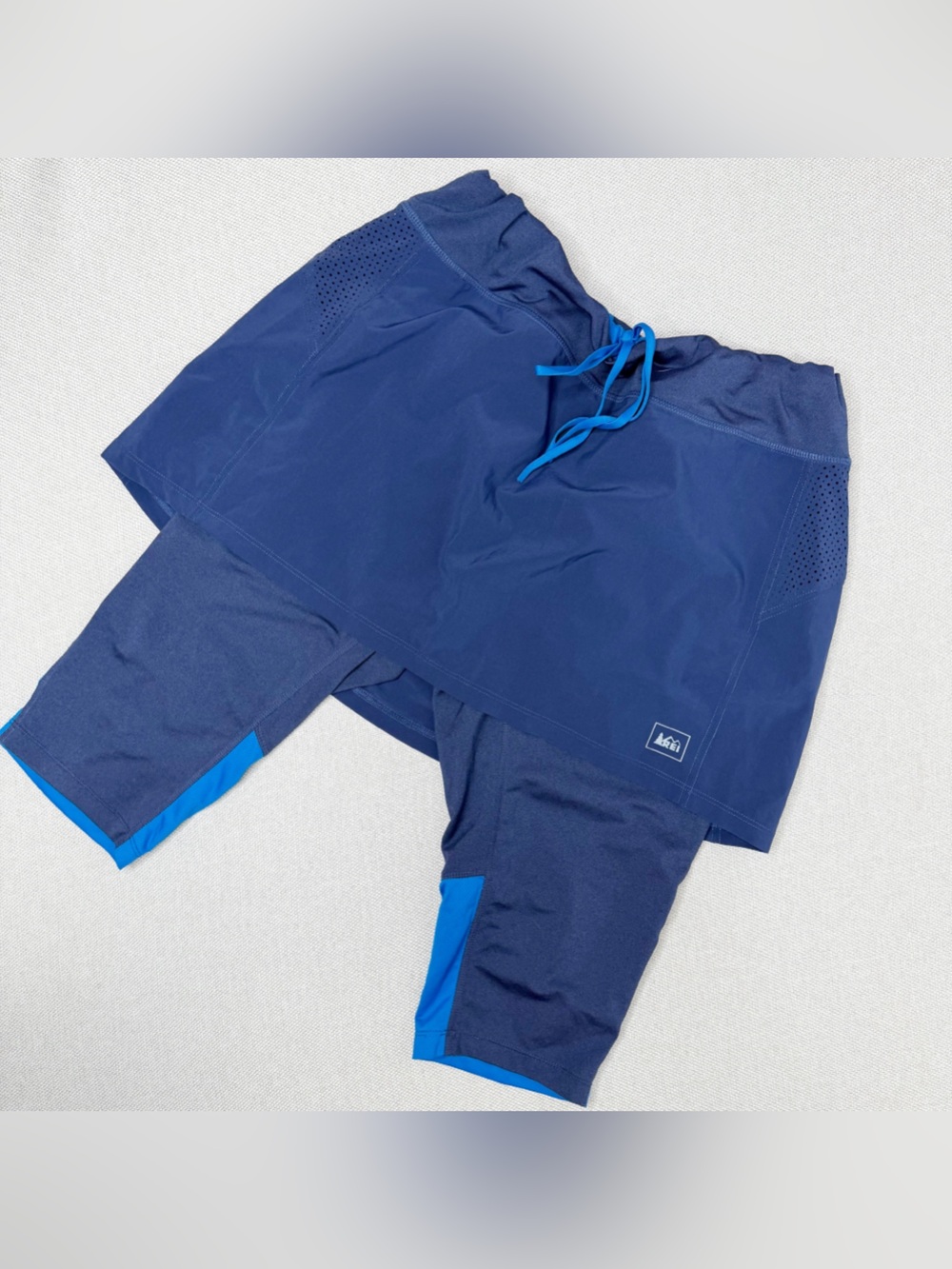 REI CO-OP Woman’s Running 2 in 1 Capri Skort Reflective Blue Colorblock Large